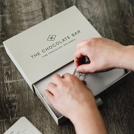Opening a Chocolate Bar gift box
