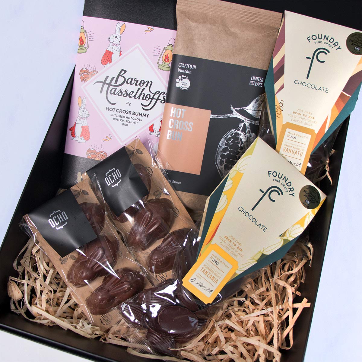 New Zealand Craft Chocolate Easter Gift Box 2024 by The Chocolate Bar. Including bars from Baron Hasselhoff's and Ocho, Half-Eggs by Foundry, and little Easter Bunnies by Ocho. 