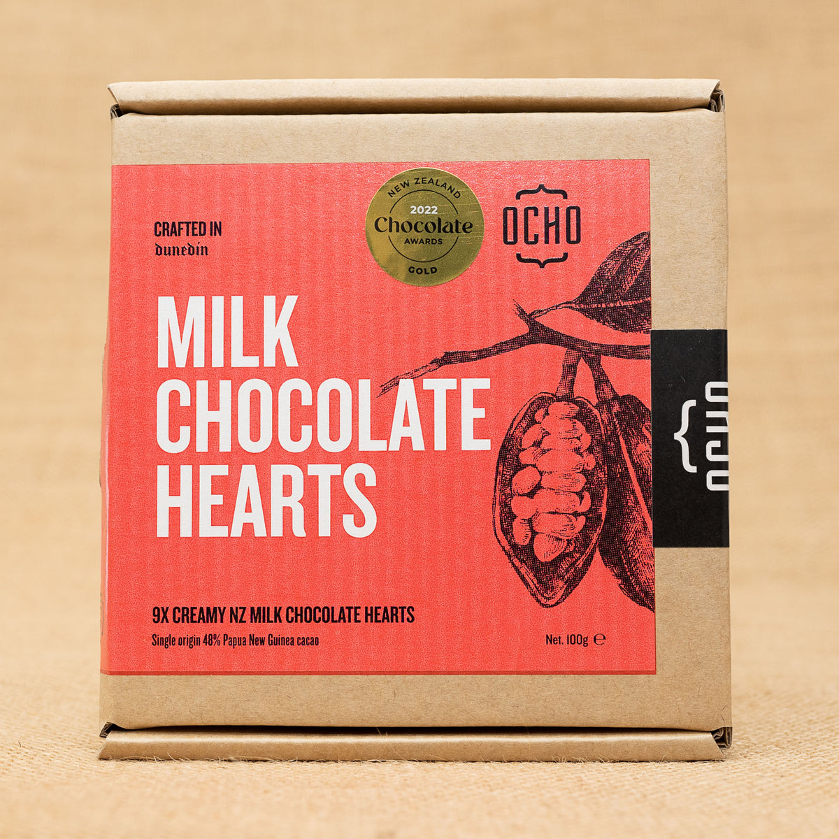 OCHO Pure Milk Chocolate Love Hearts, the front of the recyclable packaging showing the label, including a gold award sticker from the 2022 New Zealand Chocolate Awards.